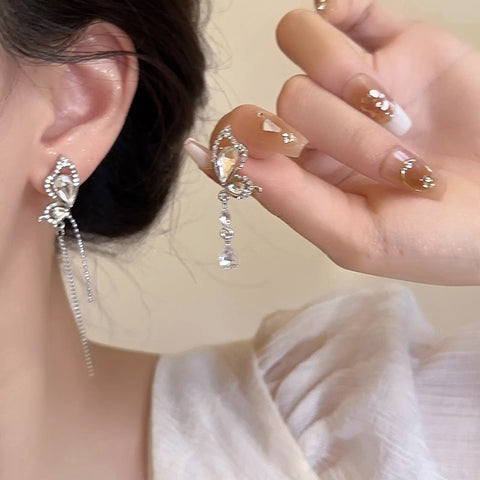 French bow tassel earrings m1915010450