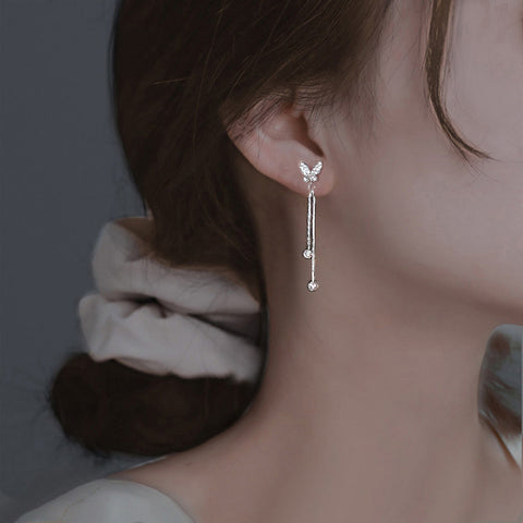 French bow tassel earrings m1915010450